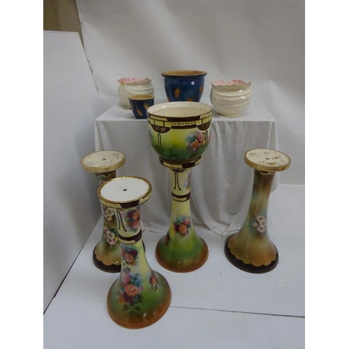 272 - A quantity of china jardineres and various stands. (some damaged)