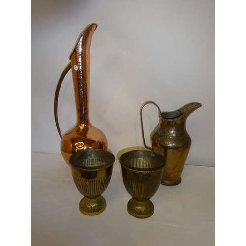 31 - A pair of brass urns together with two copper vessels. (4)