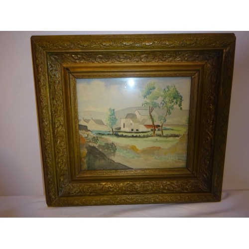 32 - Gilt framed watercolour,
Farm buildings in landscape,
Signed with initials,
Dated 1929. 
Overall siz... 