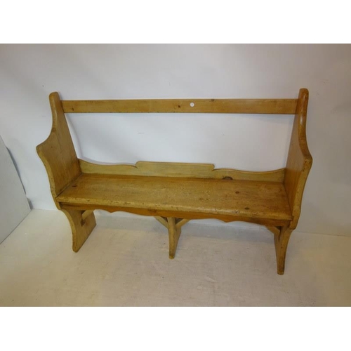 37 - Old pine bar back bench. W. 130cm, H. 95cm, D. 29cm approx.