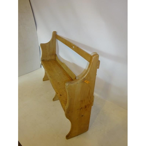 37 - Old pine bar back bench. W. 130cm, H. 95cm, D. 29cm approx.