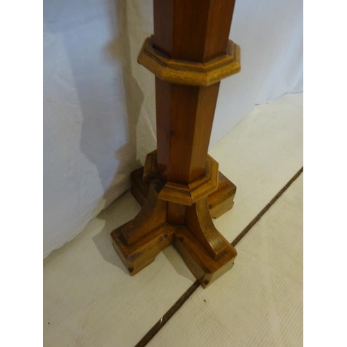 53 - A slim tall oak statue stand in the gothic style. H. 200cm, Diameter 35cm approx.