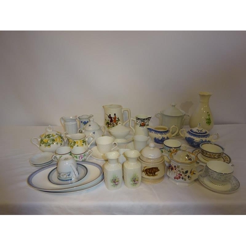 57 - A quantity of chinaware (in cabinet) to include Carrigaline pottery jug.