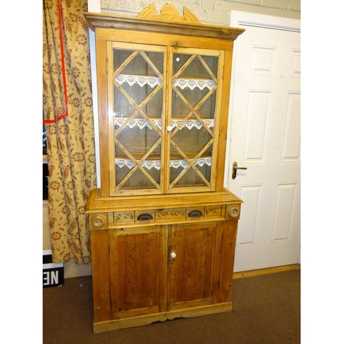 58 - Antique pine kitchen cabinet, the upper part having two section glass doors, the base fitted with a ... 