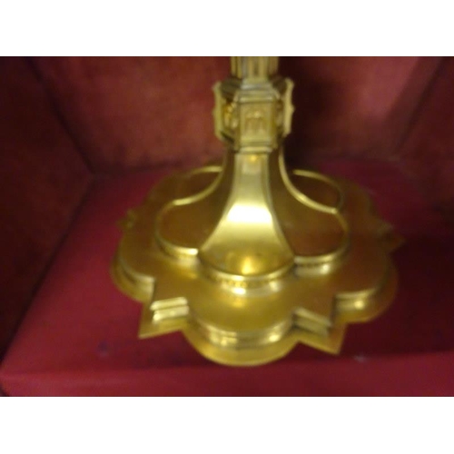 63 - A gilded Monstrance with carrying case and a brass shaped crown. (2)