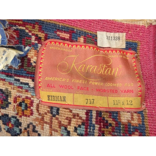 76 - A large Karstan American rug. 350cm x 380cm approx.