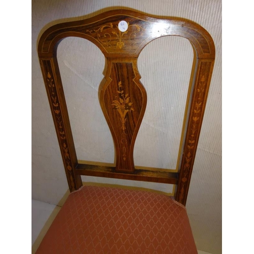 90 - A set of four antique inlaid rosewood side chairs raised on shaped legs.