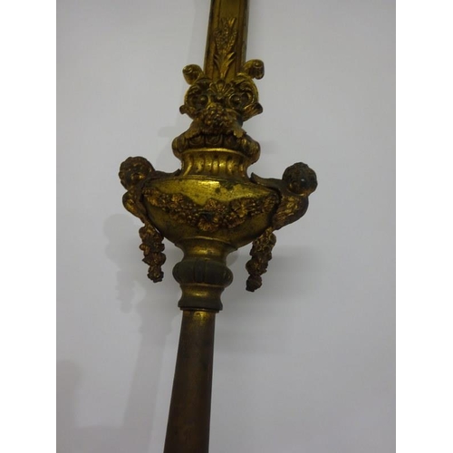 98 - A gilded brass Crucifix on long brass pole.