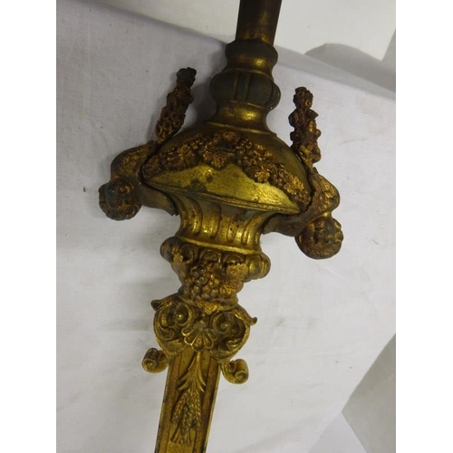 98 - A gilded brass Crucifix on long brass pole.