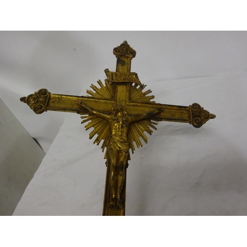 98 - A gilded brass Crucifix on long brass pole.