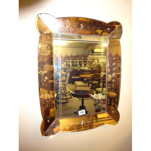 280 - Decorative glass mirror. 75cm x 60cm approx.