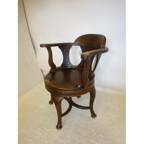 101 - Antique desk chair.