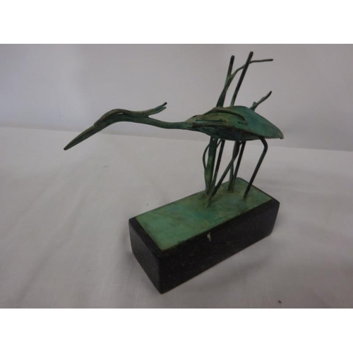 107 - Sculpture of a bird on marble base.