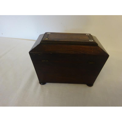 109 - Neat sized Regency rosewood tea caddy with mother of pearl decoration.