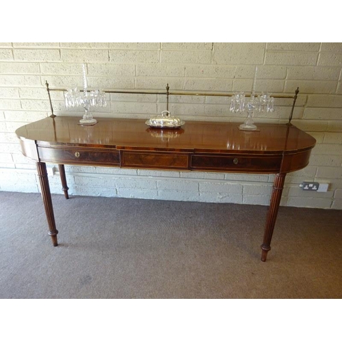 110 - A good Regency mahogany D shaped server or hall table having brass gallery fitted with three drawers... 