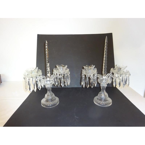 115 - A pair of Waterford glass table candleabra.