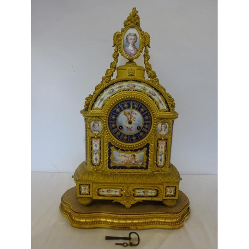 126 - A fine antique French ormulu mantle clock decorated throughout with serves panels, very original. Ov... 