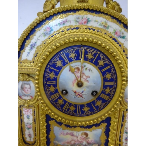 126 - A fine antique French ormulu mantle clock decorated throughout with serves panels, very original. Ov... 