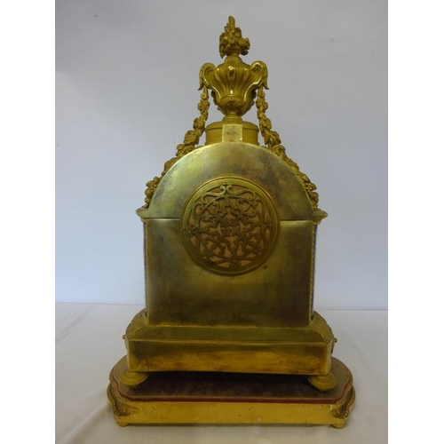 126 - A fine antique French ormulu mantle clock decorated throughout with serves panels, very original. Ov... 