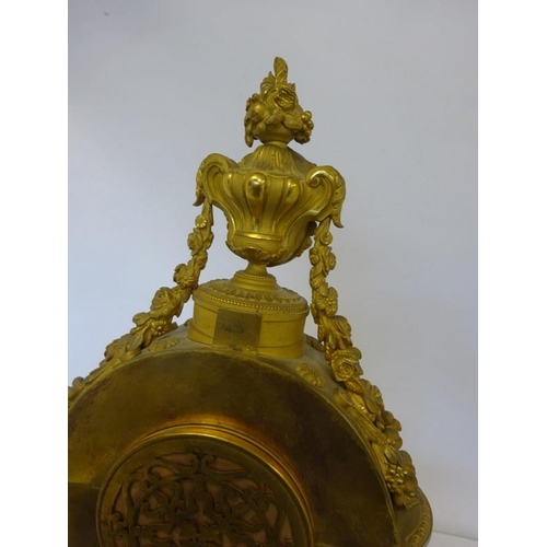 126 - A fine antique French ormulu mantle clock decorated throughout with serves panels, very original. Ov... 