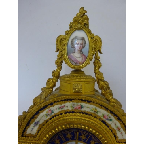 126 - A fine antique French ormulu mantle clock decorated throughout with serves panels, very original. Ov... 