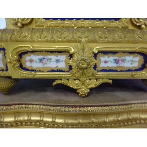 126 - A fine antique French ormulu mantle clock decorated throughout with serves panels, very original. Ov... 