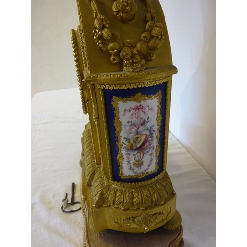 126 - A fine antique French ormulu mantle clock decorated throughout with serves panels, very original. Ov... 