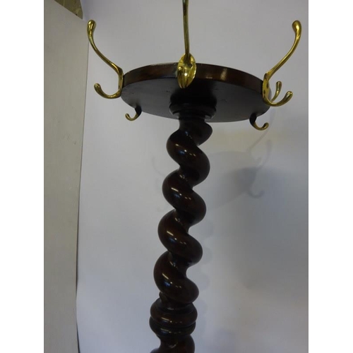 134 - Fine antique mahogany coat stand having barley twist column with tripod feet on circular base base. ... 