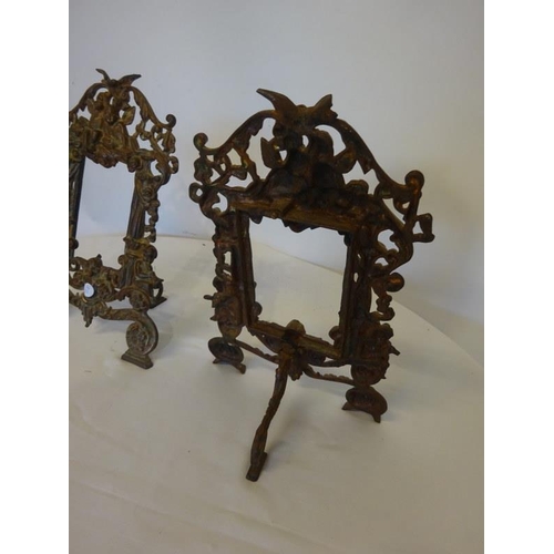 139 - Pair of antique metal photo frames.