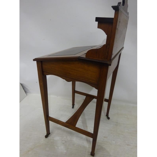 149 - An Edwardian inlaid rosewood ladies writing desk.