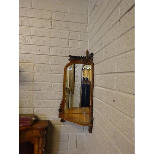 150 - Antique satinwood mirror back corner shelf unit with gilded decoration. Overall height 95cm approx.