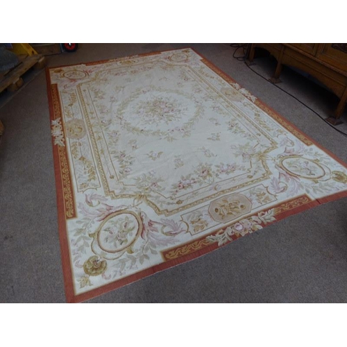 152 - Aubusson Rug with red border and floral panels.
270cm x 183cm approx.