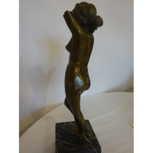 156 - Bronze figure of a nude lady on marble base. Height of figure 35 cm approx.