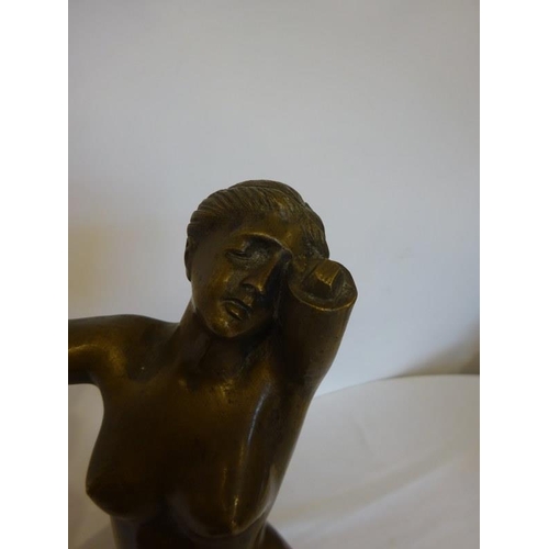 156 - Bronze figure of a nude lady on marble base. Height of figure 35 cm approx.