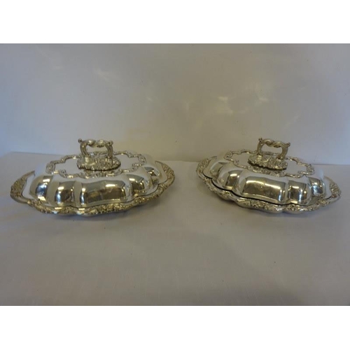 161 - A pair of Sheffield silver plated entree dishes and covers.