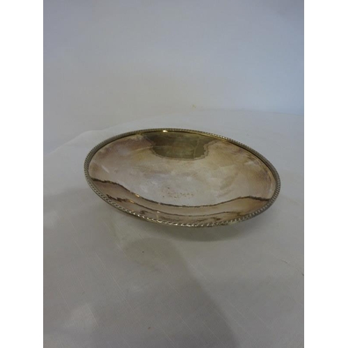 178 - A silver plated circular shaped dish by William Egan, Cork and a plated jug. (2)