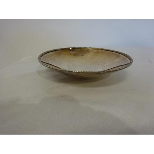 178 - A silver plated circular shaped dish by William Egan, Cork and a plated jug. (2)