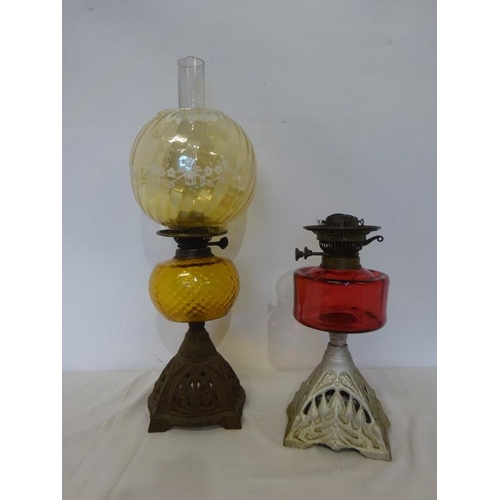 2 - Two oil lamps, red bowl with hairline crack.