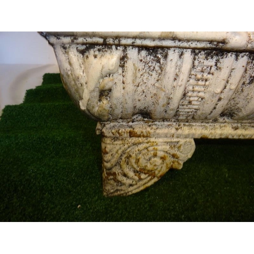 200 - A good Victorian cast iron garden planter raised on shaped feet. W. 60cm H. 40cm D. 30cm approx.