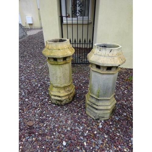 208 - A set of four 19th century chimney pots, stamped Garnkirk, (one with damage to rim) H. 91cm approx.