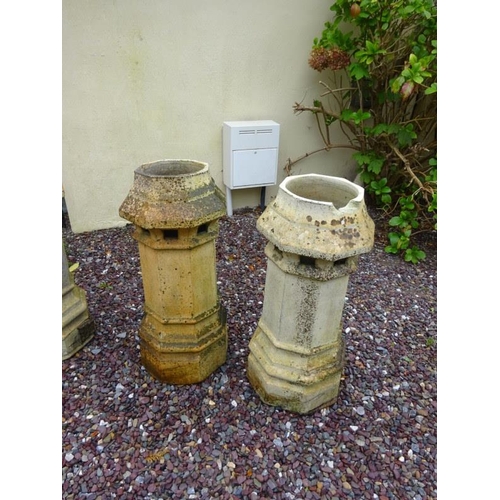 208 - A set of four 19th century chimney pots, stamped Garnkirk, (one with damage to rim) H. 91cm approx.