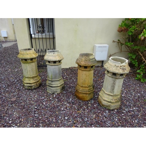 208 - A set of four 19th century chimney pots, stamped Garnkirk, (one with damage to rim) H. 91cm approx.