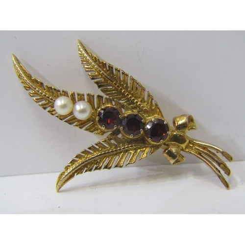 215 - 9ct gold garnet and pearl leaf brooch.