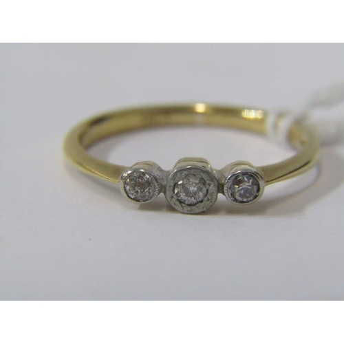 217 - 18ct gold three stone diamond ring. Size O.