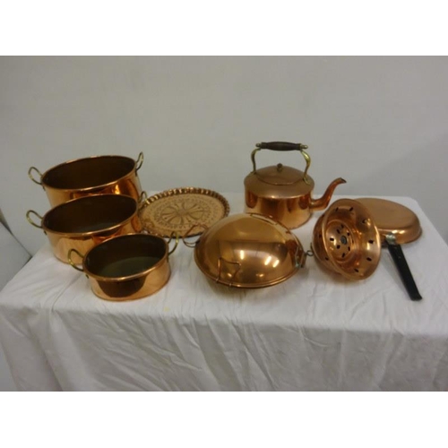 224 - A lot of copper ware - kettle, set of pans, etc.