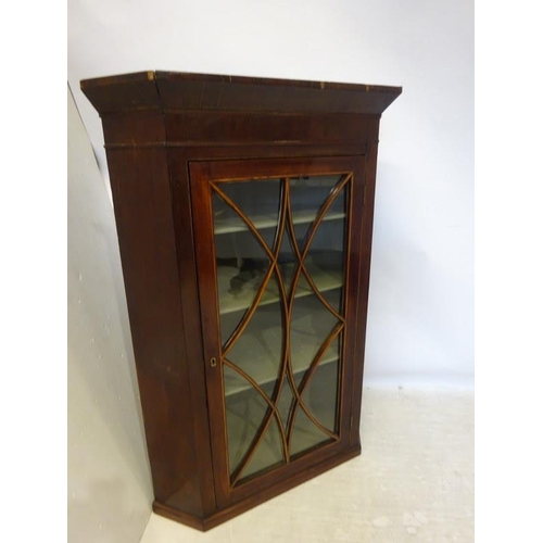 243 - Georgian mahogany hanging corner cabinet. H. 109cm, W. 77cm. approx.