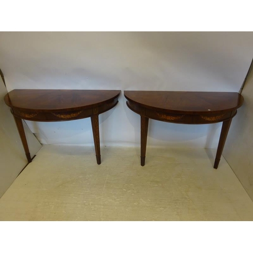 245 - A pair of inlaid mahogany console tables in the Georgian style. W. 127cm, D. 66cm, H. 76cm approx.