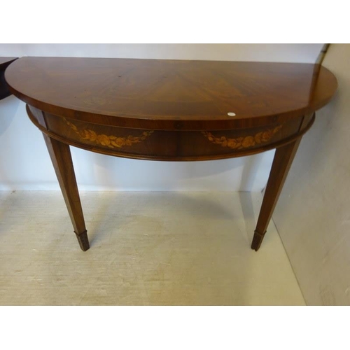 245 - A pair of inlaid mahogany console tables in the Georgian style. W. 127cm, D. 66cm, H. 76cm approx.