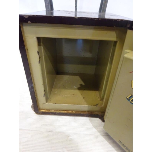 254 - Neat size Chubb safe with key. W. 39cm, D. 36cm H. 44cm approx.