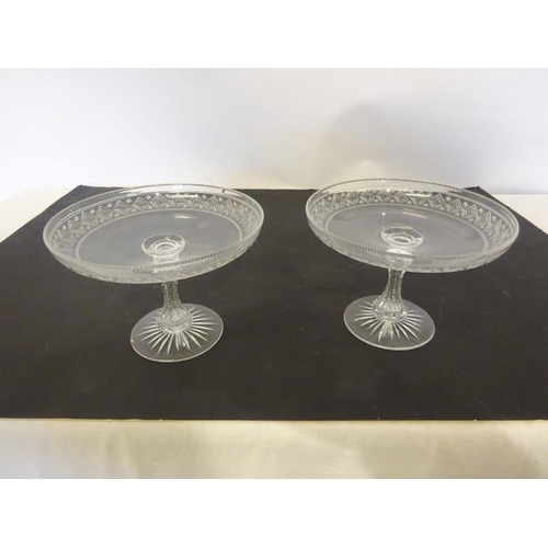 255 - A pair of fine glass tazas. (One with two very slight chips, rim on base)